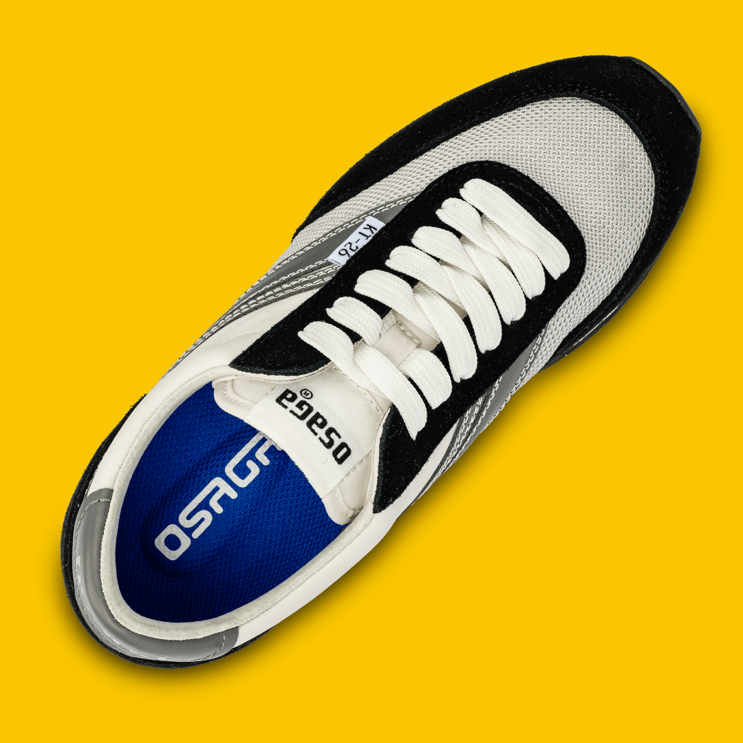 Top-down view of black and white shoe