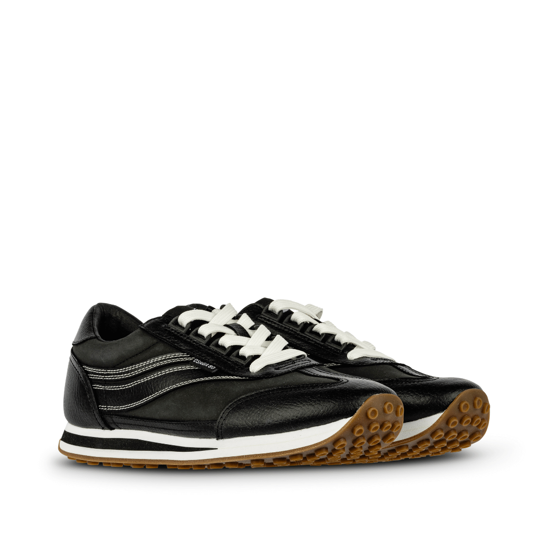 pair of osaga 80 black leather sneakers